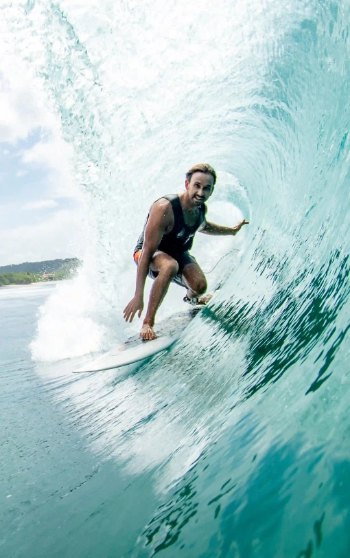 Surfer riding a wave at Nicaragua Surf Camp in Popoyo, Tola.