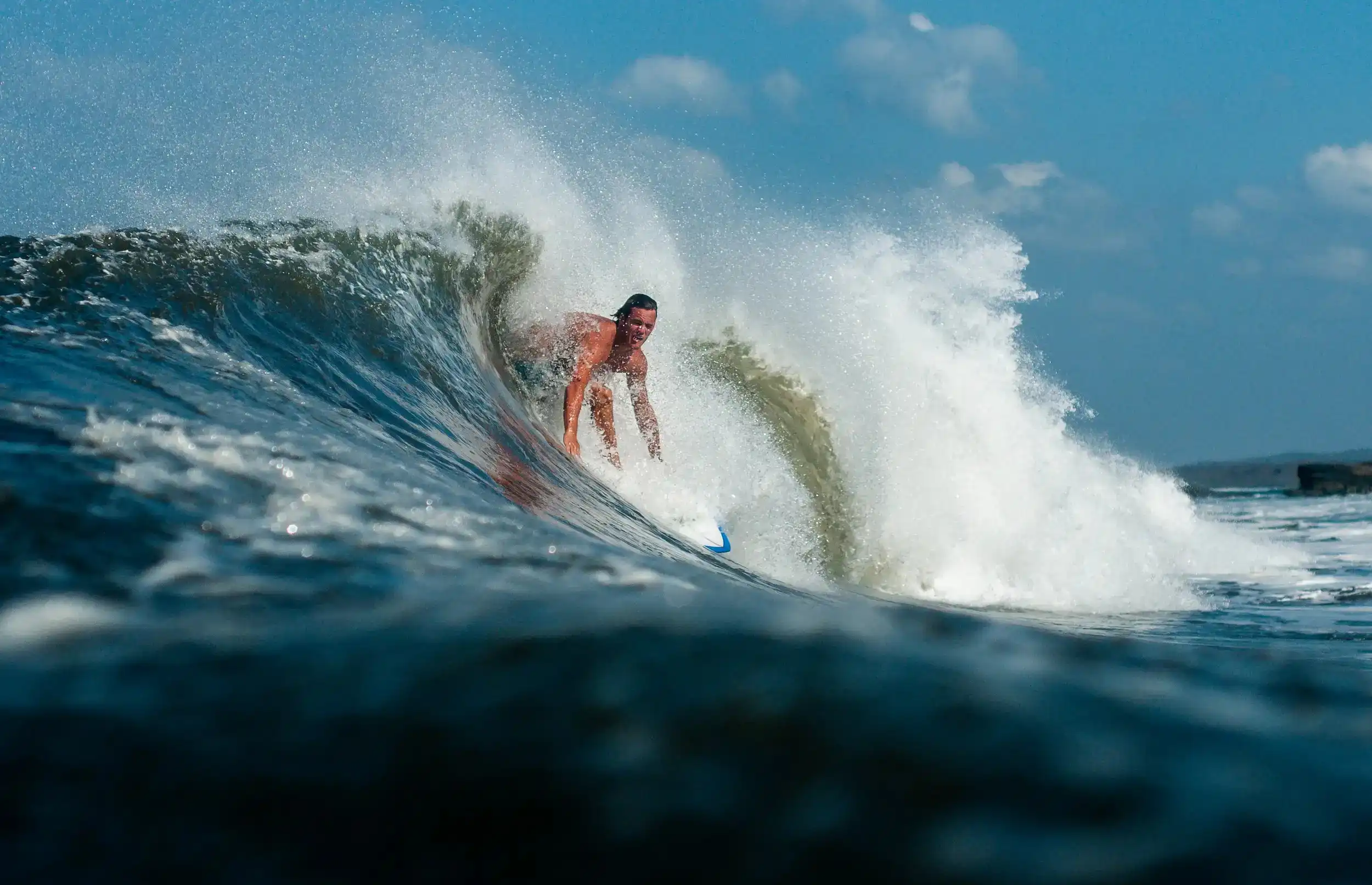 Surfer riding inside a clean, powerful wave in Nicaragua