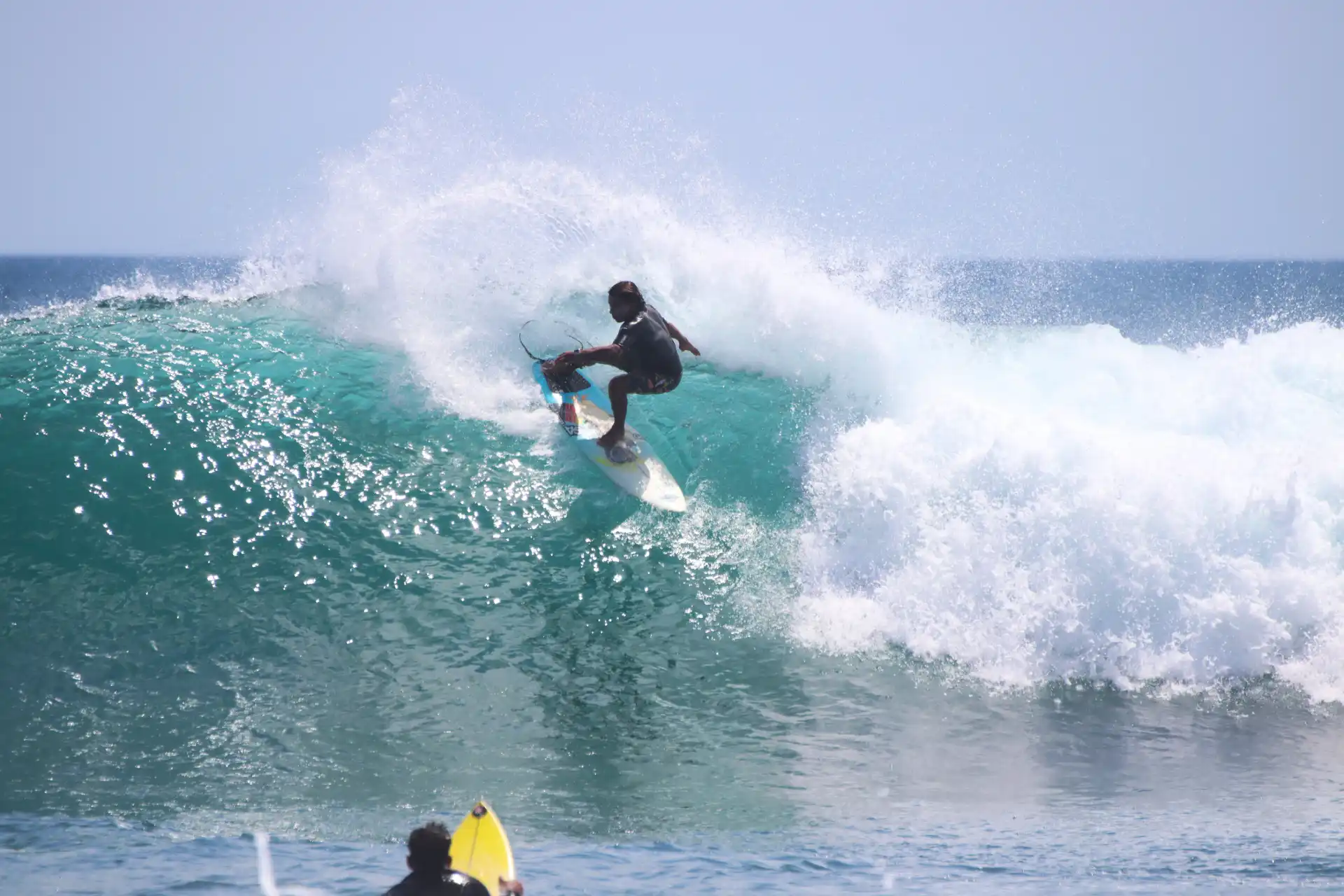 Surfer on a turquoise wave Surfing Nicaragua