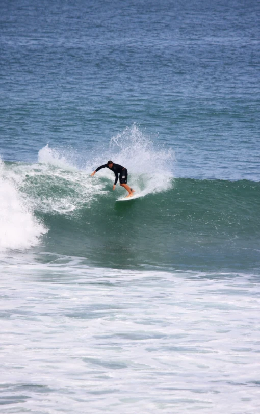 professional surf riding a wave at nicaragua surf camp popoyo tola